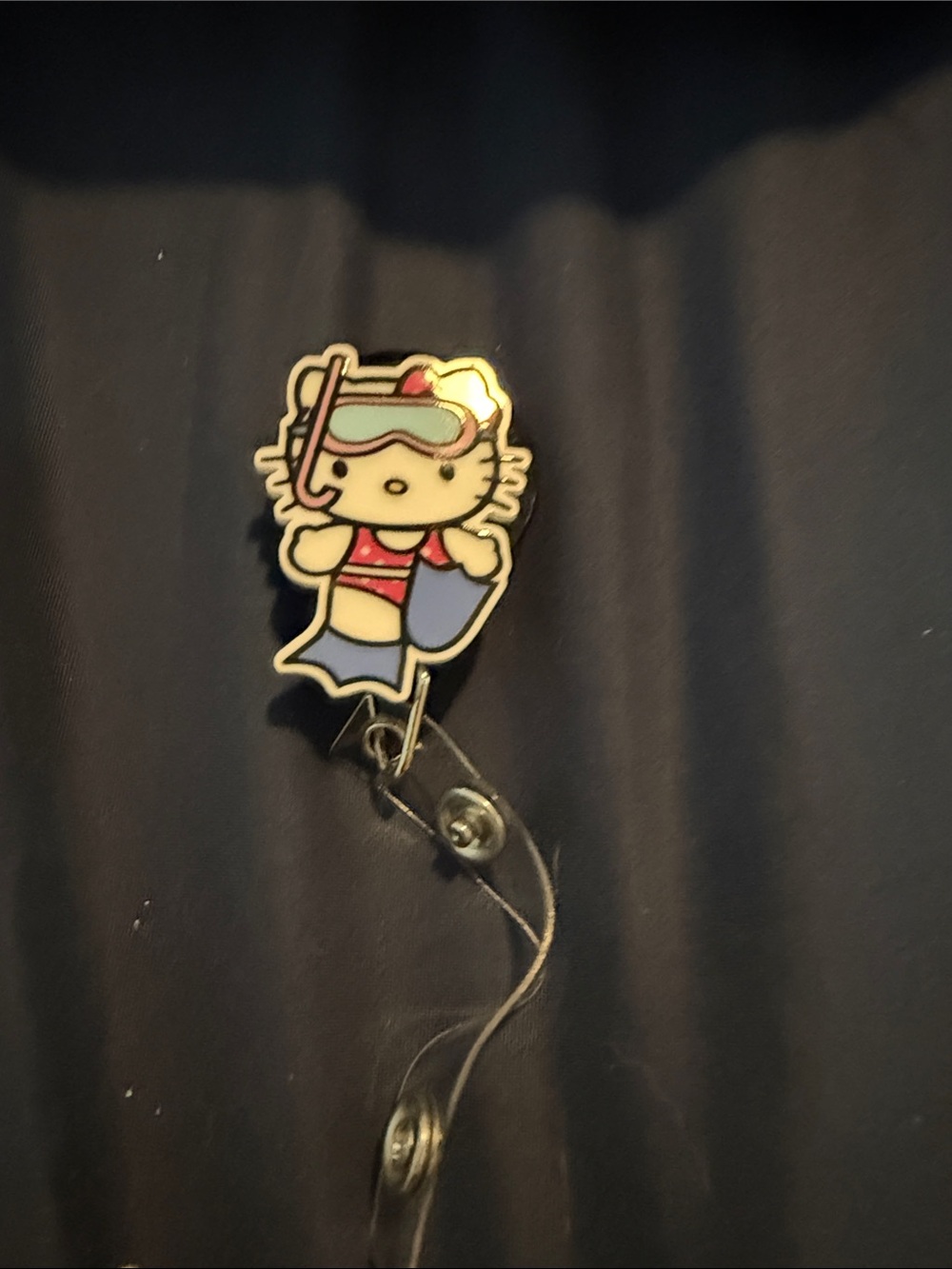 Sanrio Hello Kitty Snorkel Badge Reel in Blue and Pink